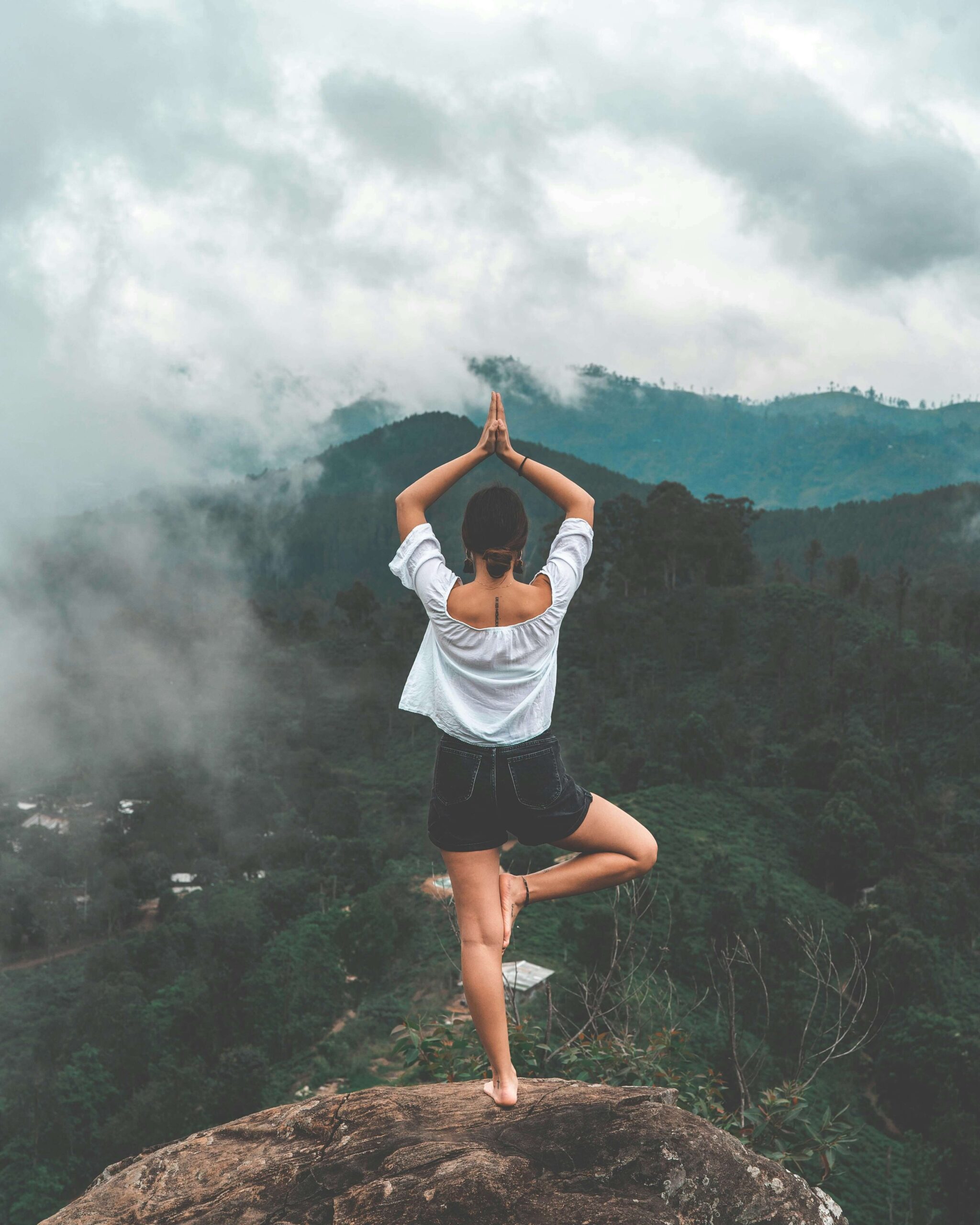 Yoga on the Mountain Peak